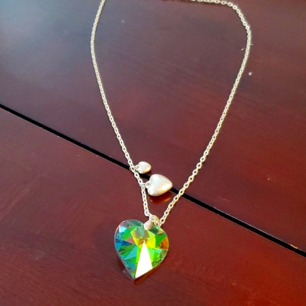 01 long necklace silver chain with heart pendants.